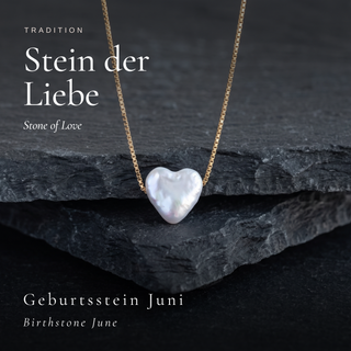 Perle als Stein der Liebe und Geburtsstein Juni – Herzperle auf dunklem Schiefer